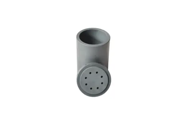 High temperature SSiC sintered silicon carbide crucible by Sialon Ceramics, featuring a grey cylindrical design and a removable perforated lid. The lid, photographed against a white background, has multiple small holes arranged in a circular pattern, likely intended for ventilation or drainage purposes.